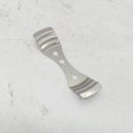 Centrador de pabilo Escalonado